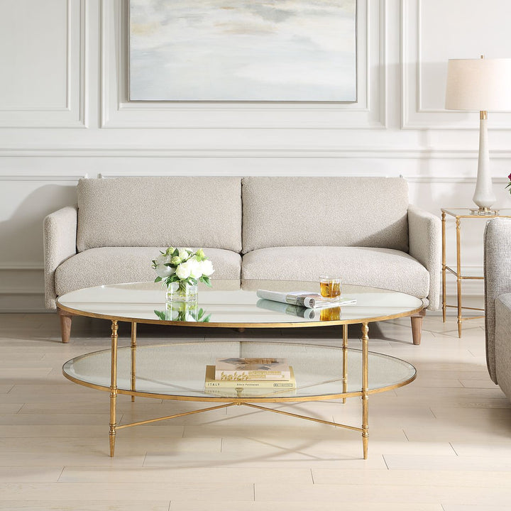 Henzler 93 W x 48 H x 134 D Gold Oval Coffee Table with Mirror Top